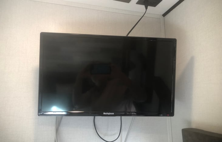 TV in Queen size master bedroom