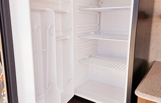 Large RV with outdoor kitchen, fireplace, and TVs