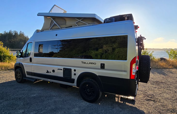 Driver side: showing water access, 30amp electrical hook up, cassette toilet access.