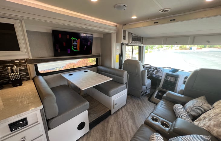 The two captains' chairs can swivel around, giving you seating for 8. Great place to hang out as a family and play some board games!