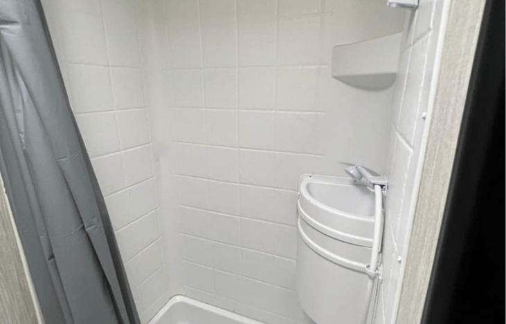 Indoor shower and sink conversion.