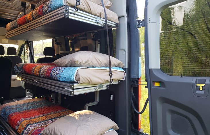 Two single bunks with single mattress on the floor