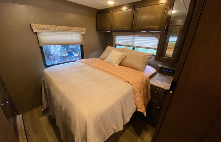 Master Bed - Queen
Small hanging closet and overhead storage. 2 nightstands, radio system with AUX ports.