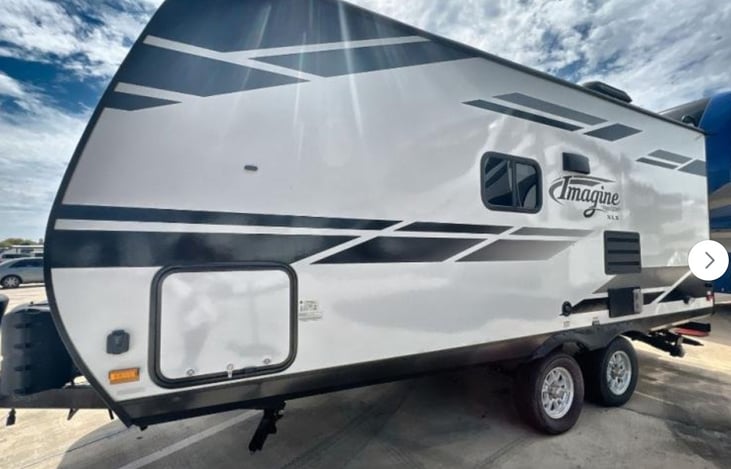 Exterior Side View: Ultralight design for easy towing and big adventures.