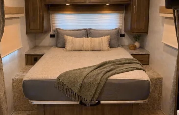 The fixed bed arrangement houses an residential-length 60" x 80" queen mattress flanked by dual wardrobes and nightstands. We also supply linens, pillows and towels!!