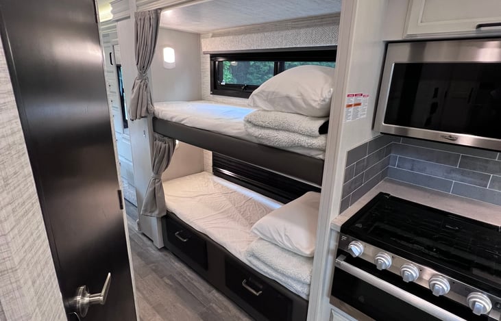 Bunk beds with privacy curtain