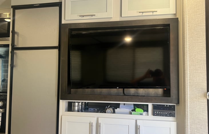 Inside- TV and Refrigerator