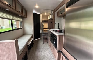Cozy Home on Wheels: Lightweight Travel Trailer