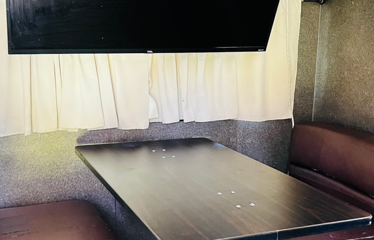 Dinette with 50 inch smart HDTV.