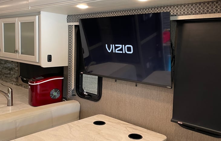 Beautiful TV in the Kitchen and living room. Easy to view with great sound quality.