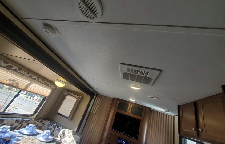 AC unit with air registers throughout cabin.