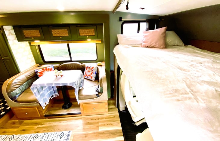 Spacious cabover bed for two — perfect for families and pet-friendly RV rentals.