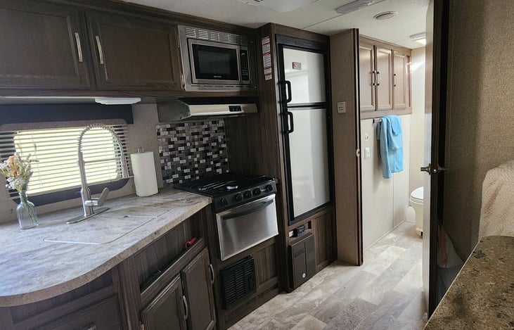 Kitchen with a view of the bathroom