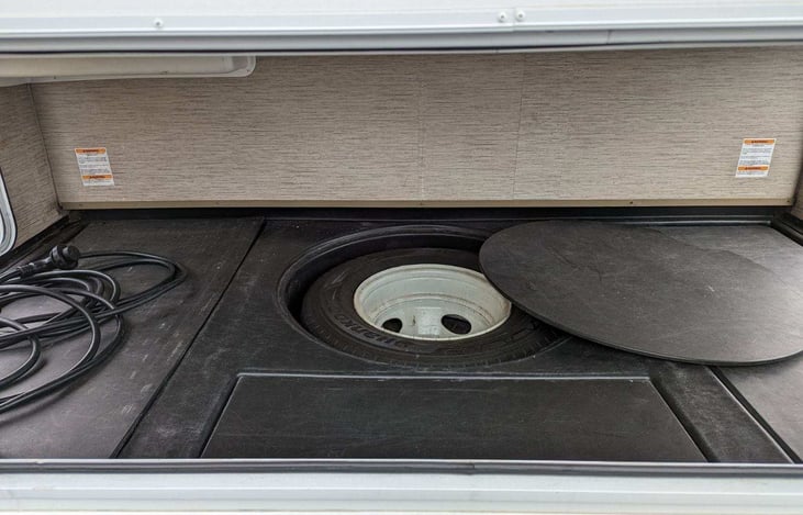 Rear compartment with multiple entry points allowing for easy access to cargo