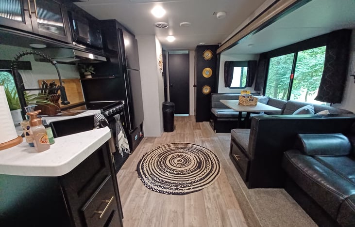 Main living area looking towards the rear of the camper