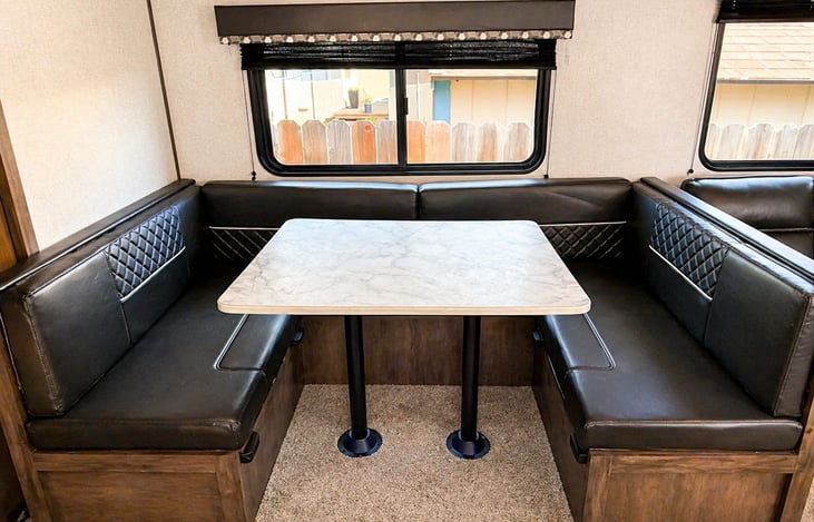 Spacious dining area perfect for meals, games, or planning your next adventure