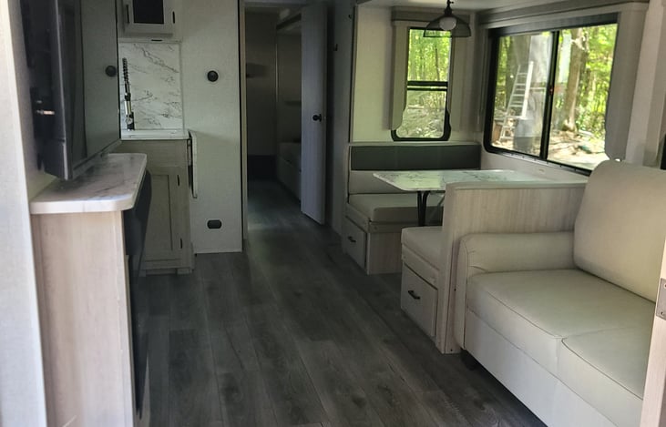 The living room and kitchen, this is a slide out!