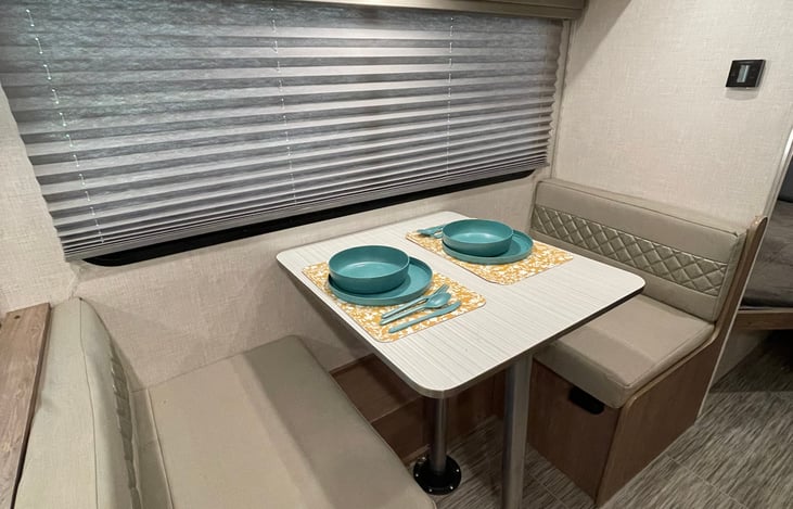 Dinette easily converts into a single bed.