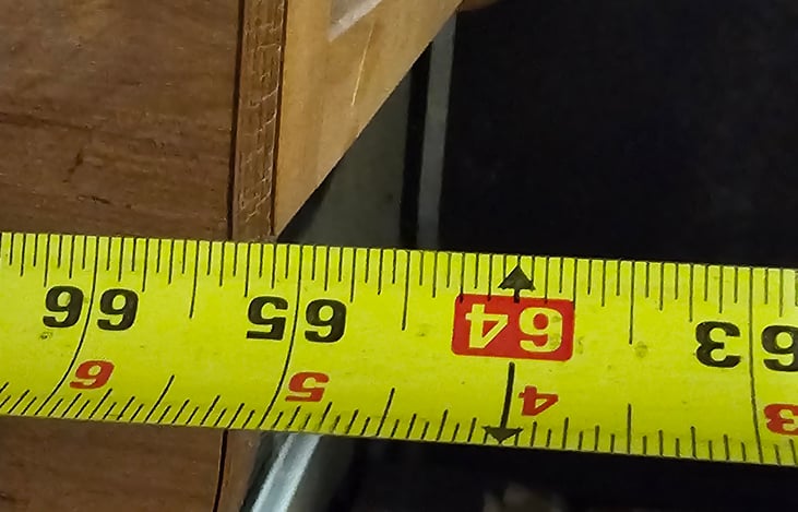 Maximum width is 65".