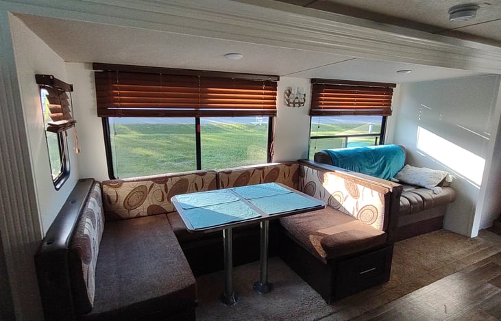 Dinette and sofa fold down to make additional beds