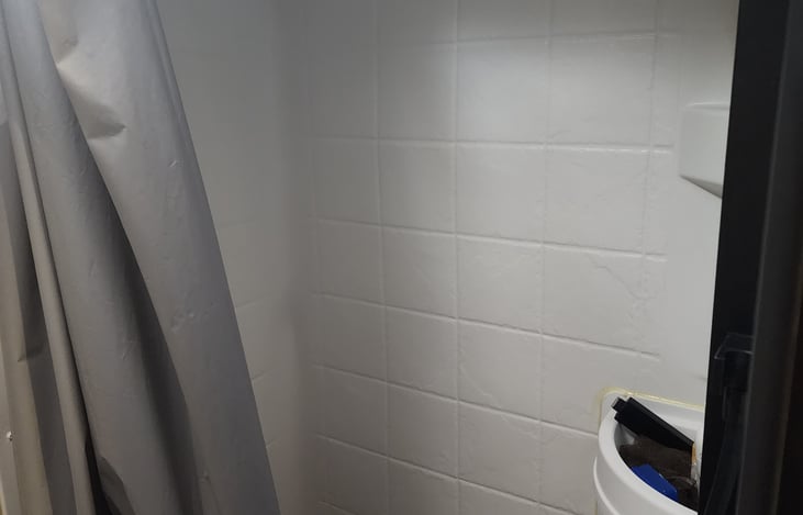 Shower and small shower sink in case you brush your teeth in the shower or something.