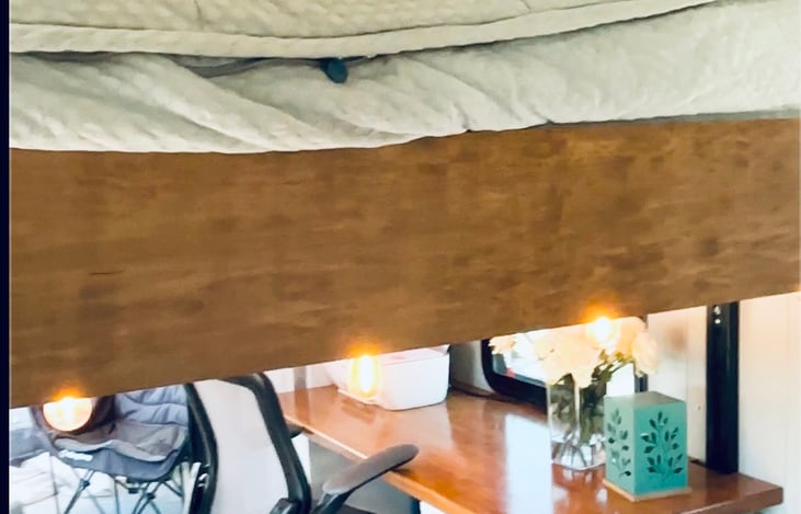 The master bed is a king and is on a Happy Jack system that go up and down- allowing the bed to be up and out of the way during the day - making the room a great office space.