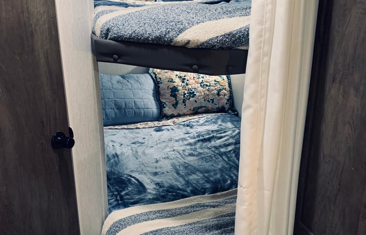 Top and Bottom Bunk Beds.
(Twin XL Bunks Can Sleep 4 Total.)