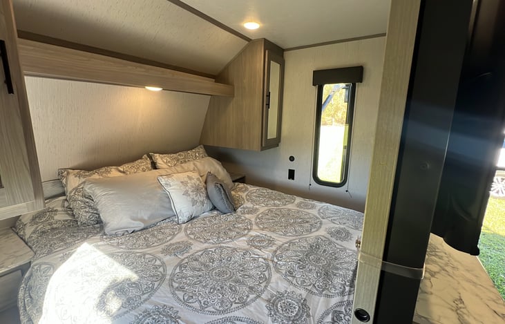 Private Queen bedroom with side tables.