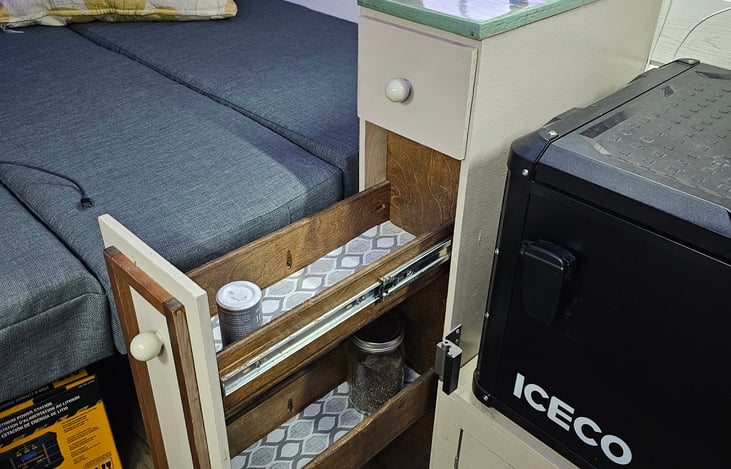 Pull out cabinet space where you can store food, spices, or whatever you like