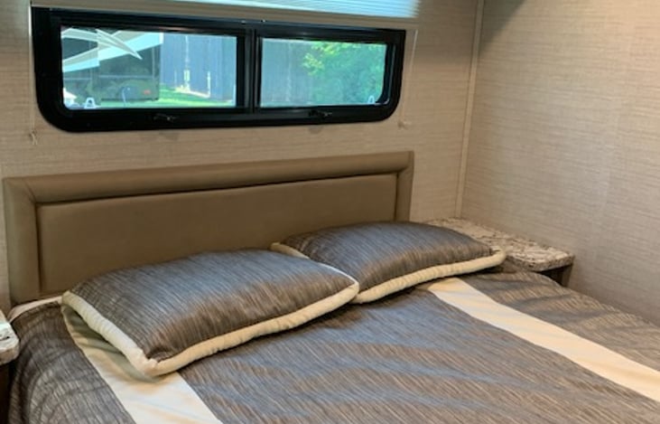 queen bed with open shade