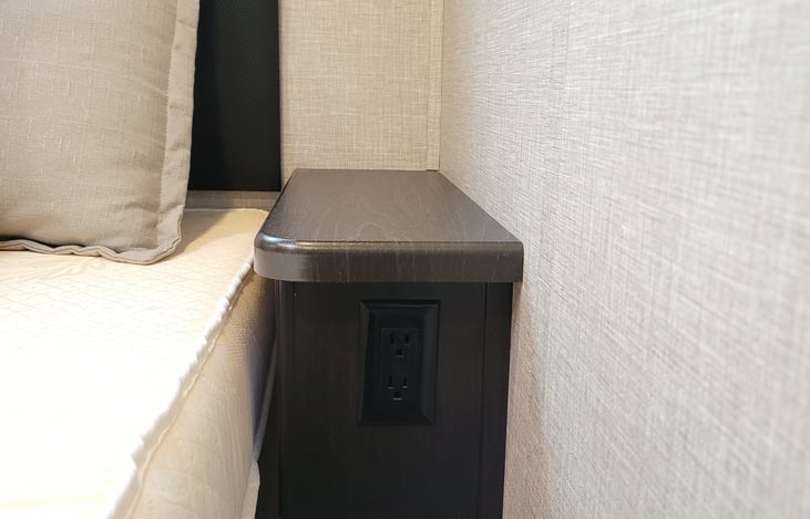 Rear Bedroom - Outlets in convenient location next to  bed.