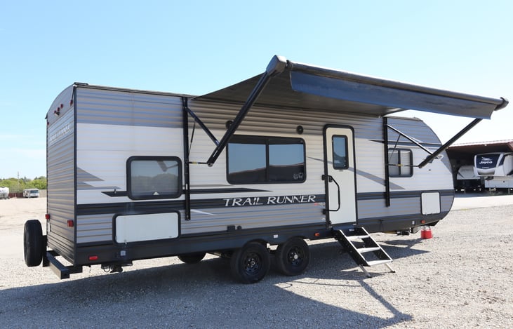 rear 3/4 exterior with awning extended