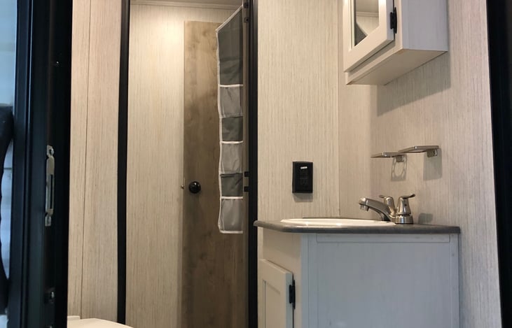 bathroom with outside exit door great for the beach