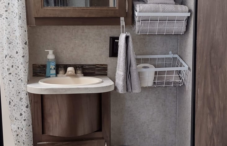 Full bathroom.  Comes with towels/washcloths, toilet paper and hand soap.