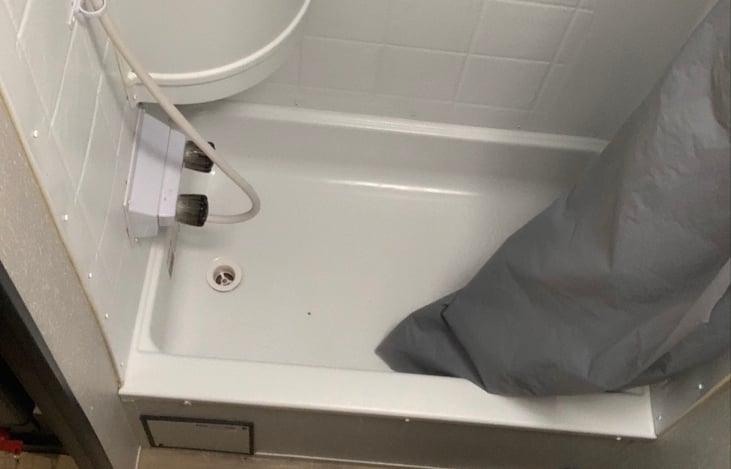 We love that this adorable camper comes with a small tub, and bathroom sink!