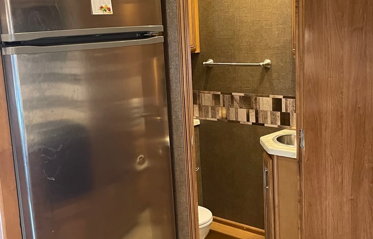 House refidgerator and 1/2 bath