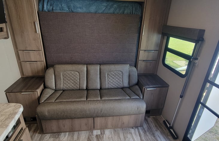 Lots of storage and sofa that flips down for the murphy bed when the day ends.  Also flips as a day bed for a quick rest from the mountains, lake, or beach!
