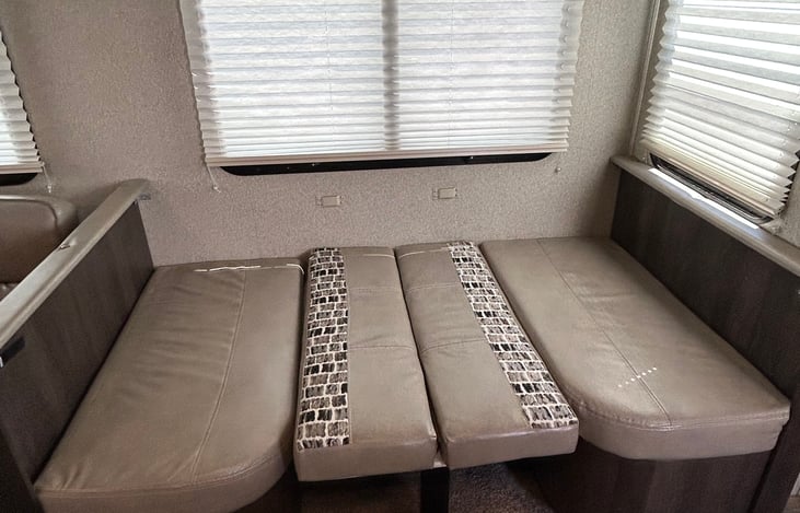 The kitchen table can turn into an extra bed