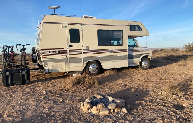 If off grid camping is your thing - the Winne is set up for boon docking! Pictured here at BLM land in New Mexico, she is outfitted with optional bike rack and Starlink Satellite Wi-Fi access.