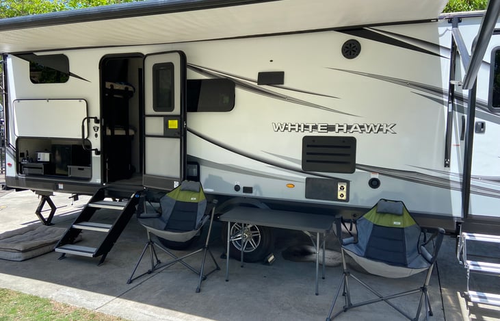 Comes with hammock chairs and table