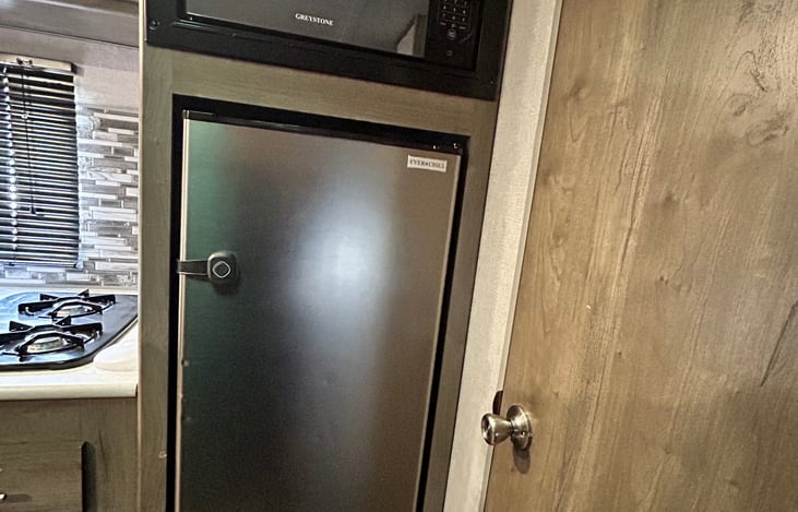 Above fridge microwave