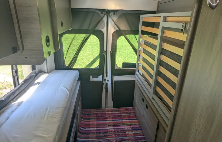 Rear with bed folded up.