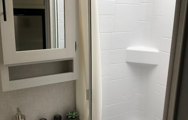 Nice size bath with walk in shower