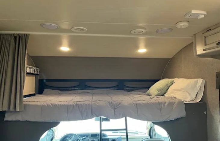 above the driver queen bed space