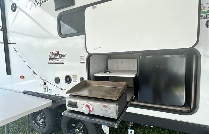 OUTSIDE GRILL (FRIDGE HAS BEEN REPLACED WITH ICE MAKER)