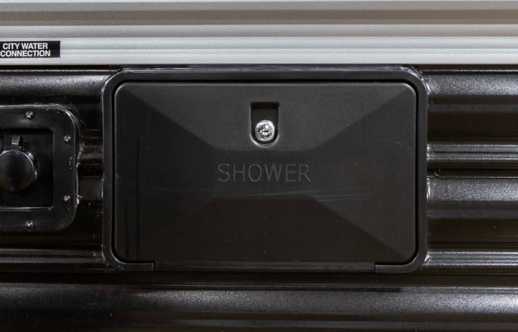 Outdoor shower wand with hot and cold water.