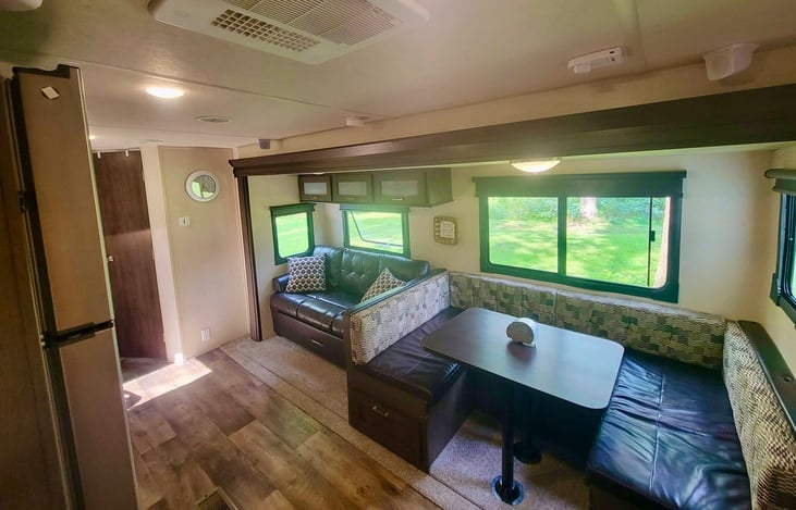 Pullout sofa bed and convertible dinette.