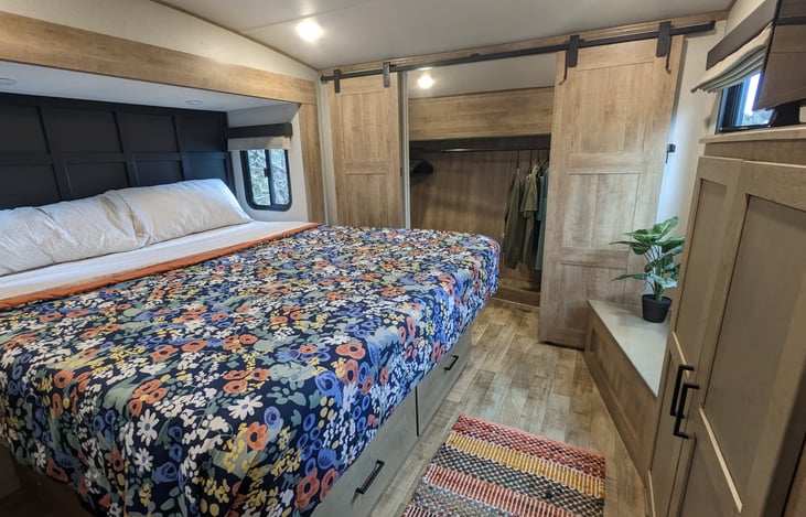 Primary bedroom with California King bed and large closet