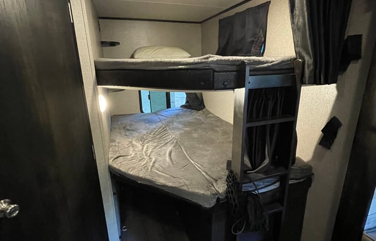 double queen bunk beds with built in ladder & privacy skirts