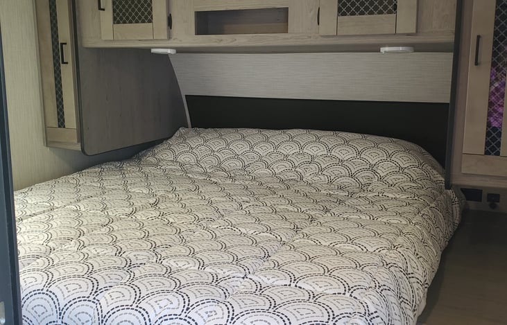 King size bedroom sleeps two and maybe a little kid if they sneak into your bed. Linens and pillows are included.  Extra linens and blankets are in the hallway closet.